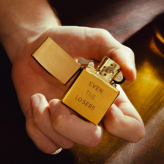 'Even the Losers' Stamped Brass Zippo